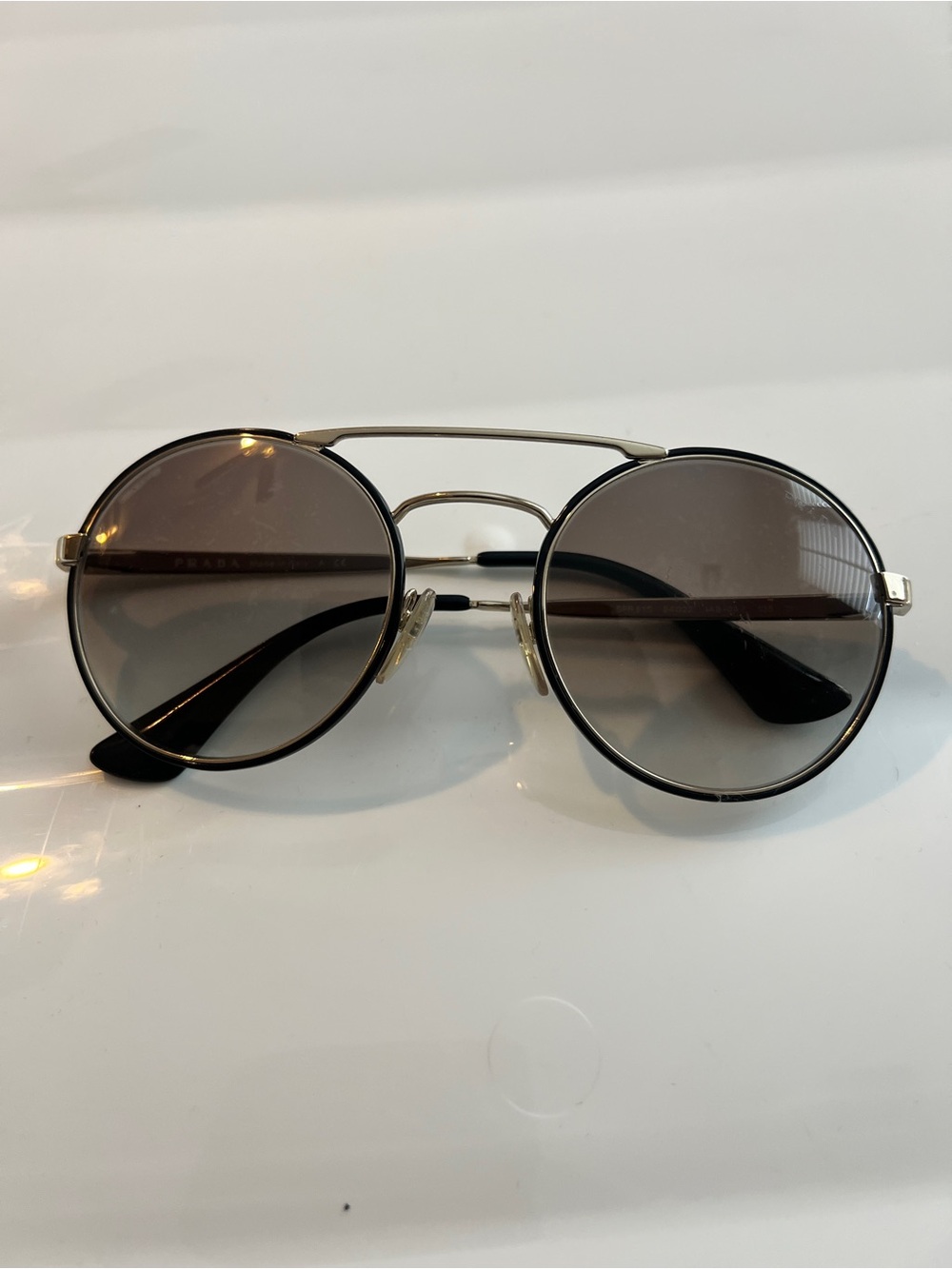 Prada Round Double-Bridge Sunglasses in Black and Brown